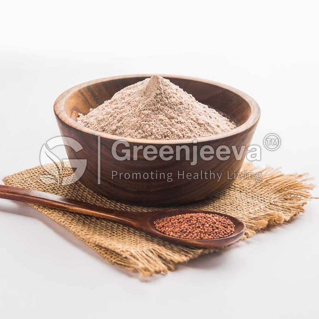 A wooden bowl filled with Finger millet seed extract powder 10:1 rests on a textured mat, next to a small spoon of dark red seeds.