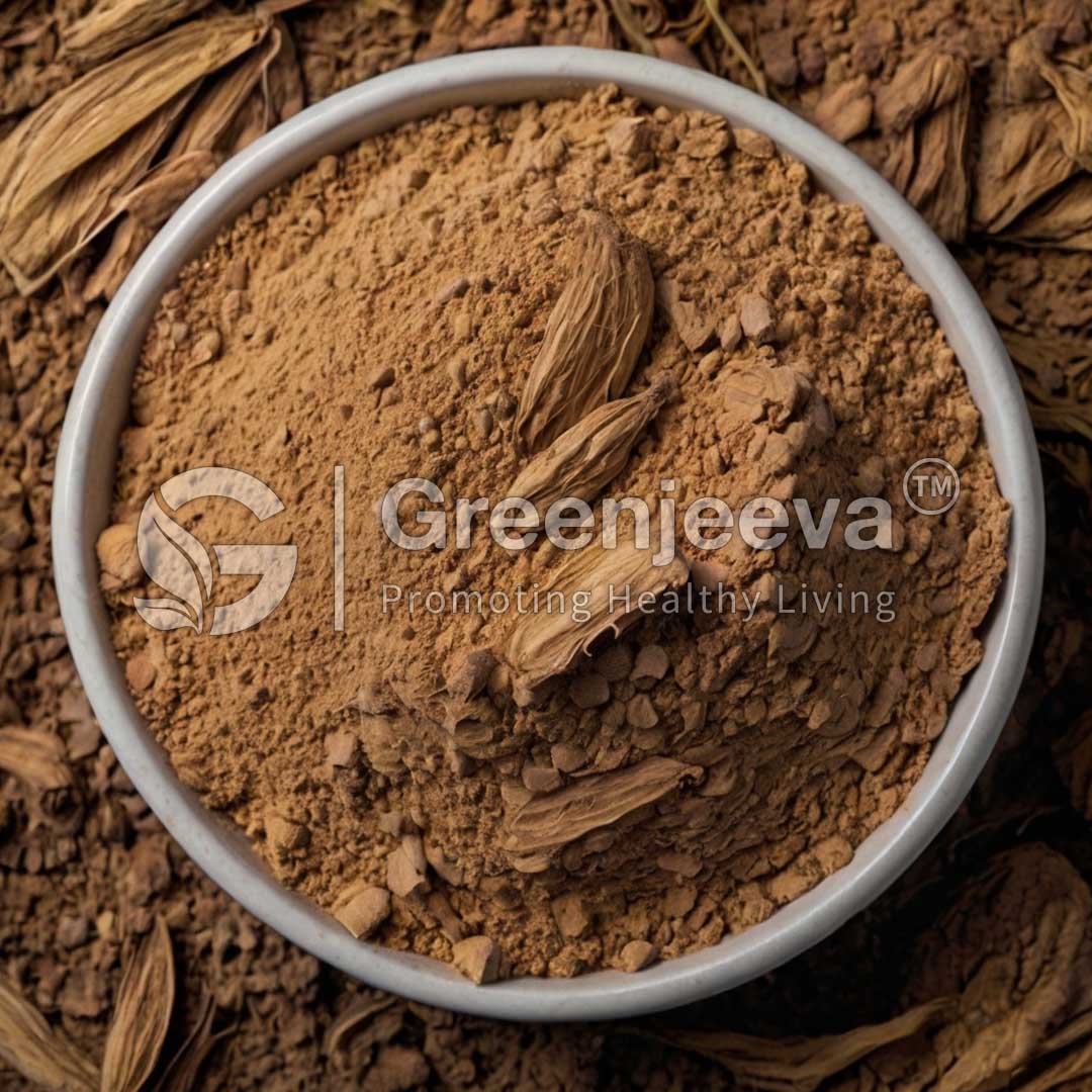 A bowl of Sarsaparilla Root Extract Powder with whole cardamom pods, surrounded by dried cardamom shells, promoting natural health.