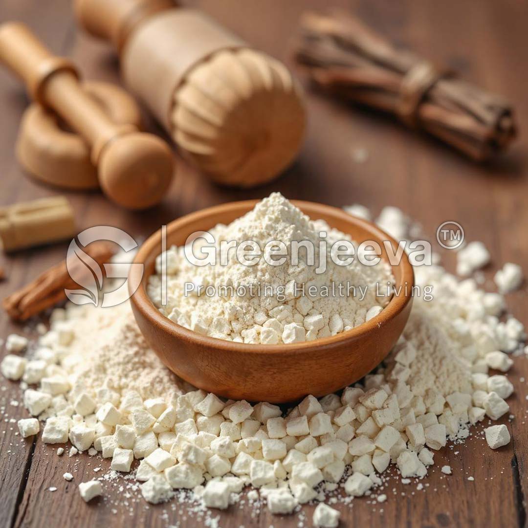 A wooden bowl filled with Chicory Powder, surrounded by scattered powder and spices, with a wooden mortar in the background.