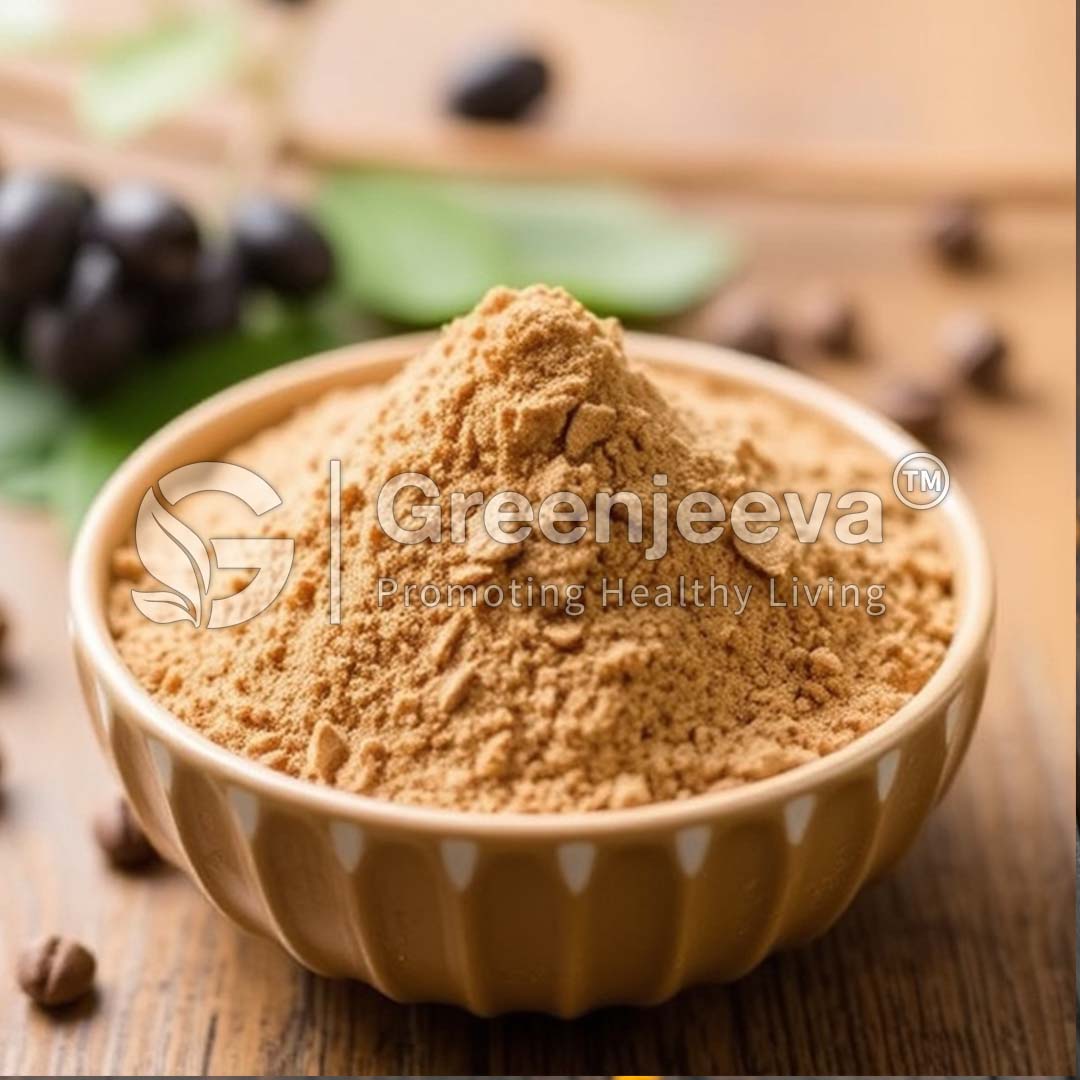 A bowl filled with fine Guarana Extract Powder 22% Caffeine, surrounded by dark seeds and green leaves, on a wooden surface.