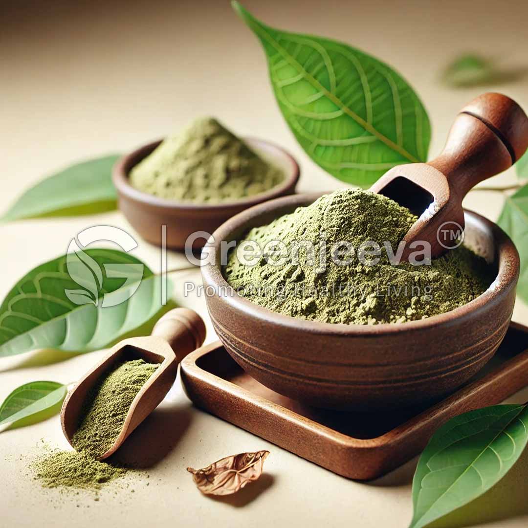 Two wooden bowls filled with Gymnema Leaf Powder sit beside fresh green leaves, with a scoop resting on the side, showcasing natural ingredients.