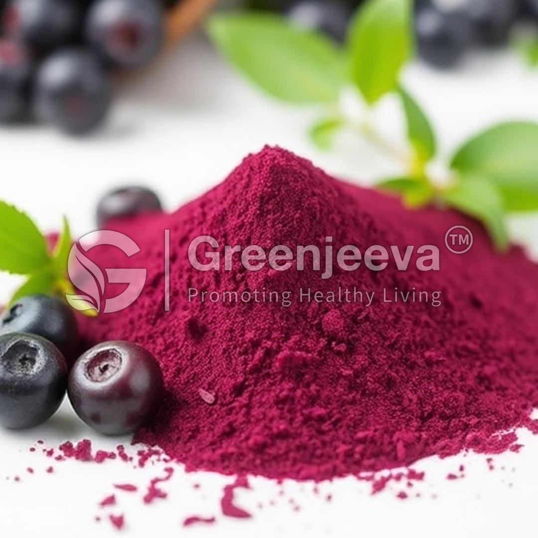 A vibrant mound of Organic Bilberry Fruit Powder surrounded by fresh blueberries and green leaves, symbolizing health and nutrition.