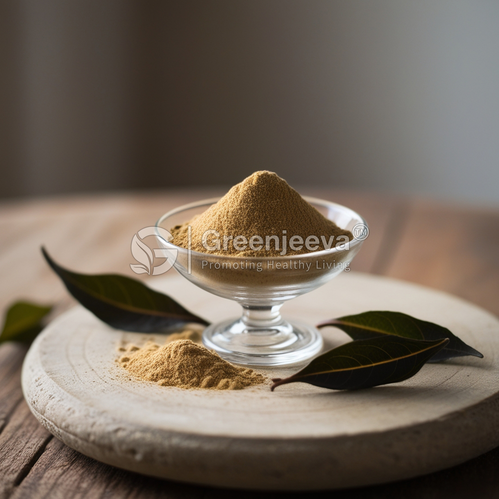 A glass bowl filled with Organic Burdock Root C/S is placed on a wooden surface, accompanied by green leaves and some spilled powder.