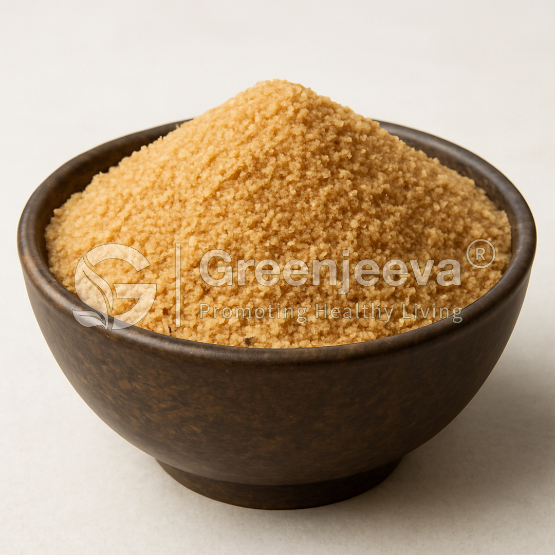 A wooden bowl filled with finely granulated maple sugar, showcasing its sweet texture and natural color.