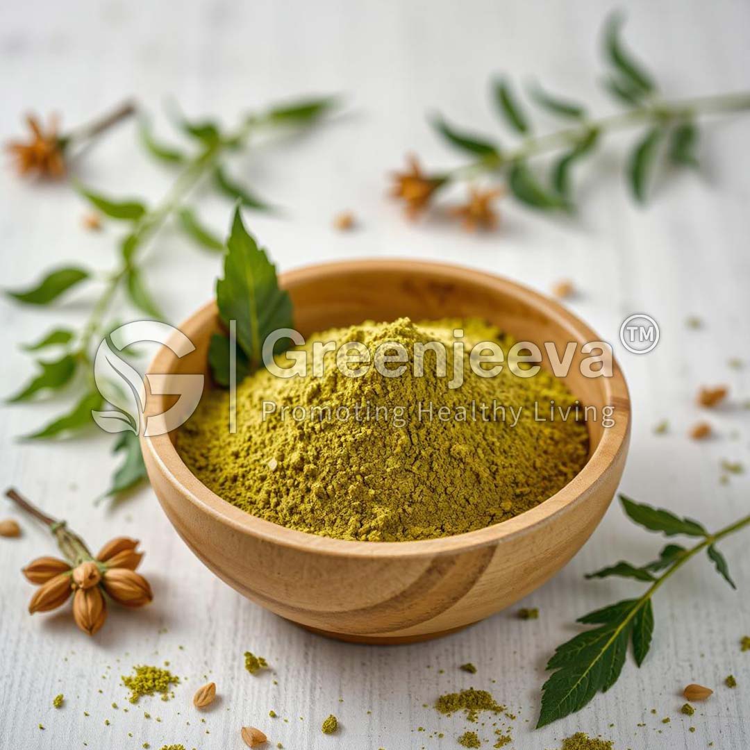 Bowl of vibrant Organic Marjoram powder surrounded by fresh leaves and seeds on a wooden surface. Greenjeeva branding visible.
