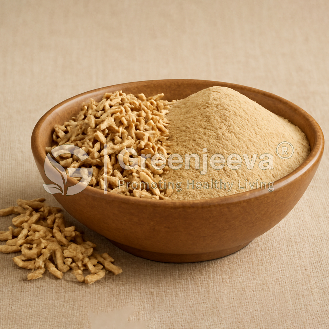 A wooden bowl contains a mound of Organic Marshmallow Root powder and textured pieces, showcasing natural health food ingredients.