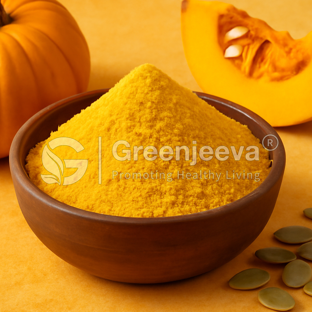 A bowl of bright yellow pumpkin powder sits beside a whole pumpkin and a sliced piece, with pumpkin seeds scattered around.