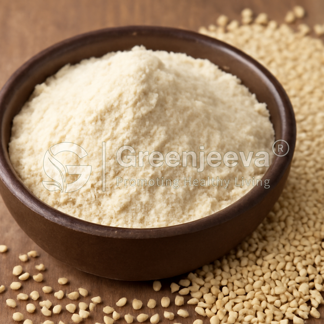 A brown bowl filled with fine, Organic Quinoa Seed powder, surrounded by sesame seeds on a wooden surface.