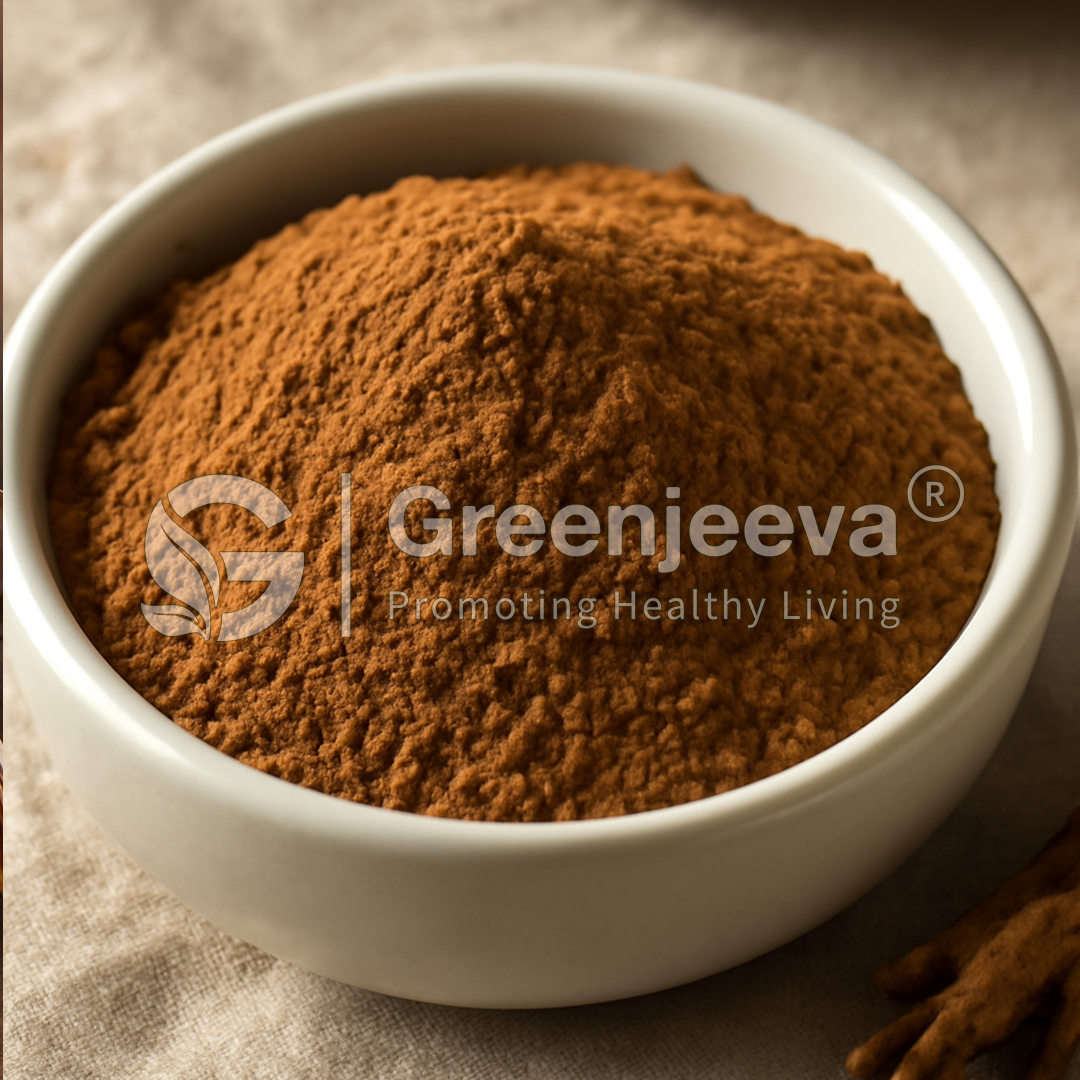 A close-up of a white bowl filled with Polypodium Leucotomos Rhizome Extract brown powdered spice, with a piece of the spice root beside it, on a textured surface.