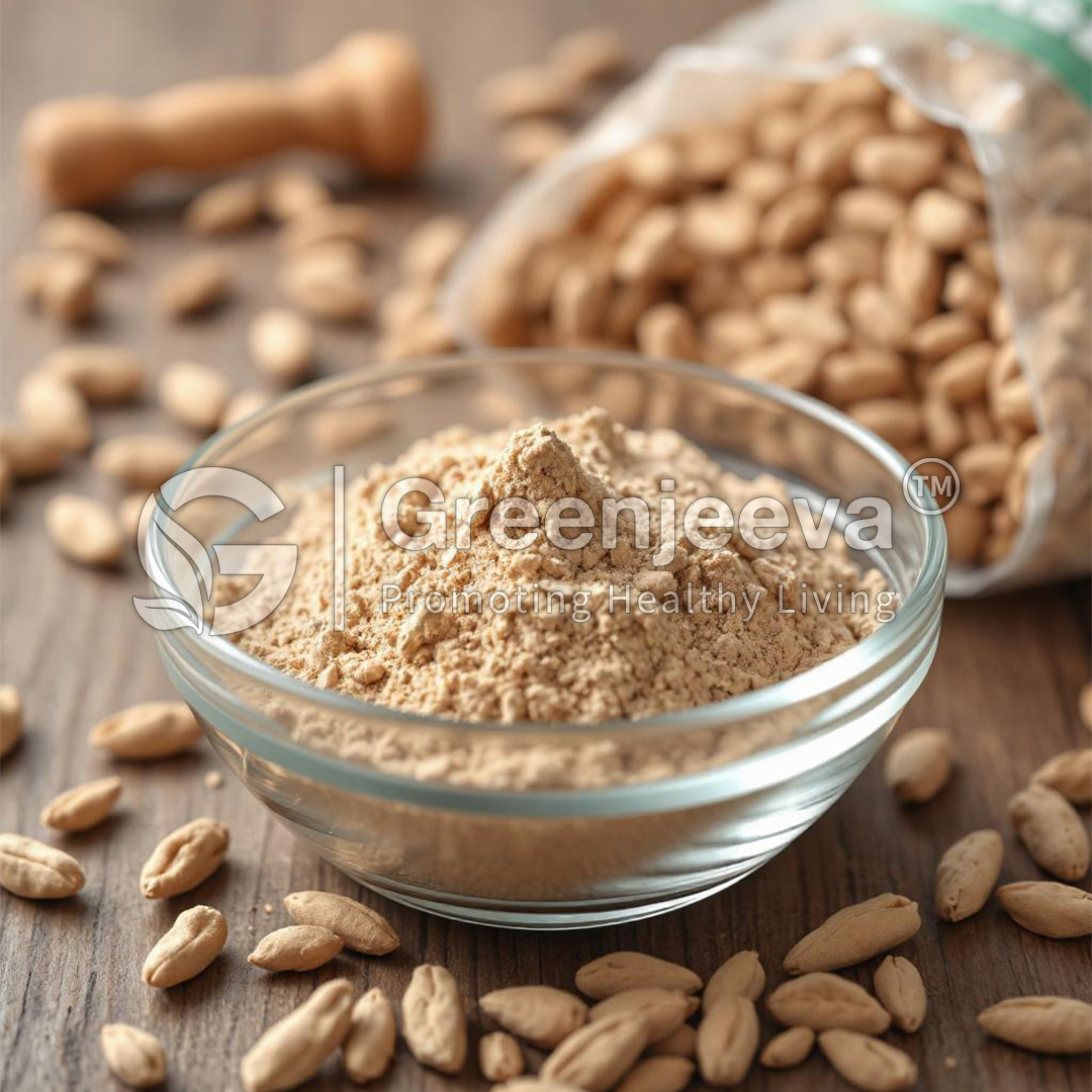 A glass bowl of Quassia Amara Powder sits on a wooden table, surrounded by scattered seeds and a partially open bag of seeds in the background.