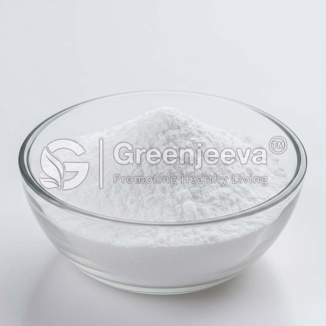 A clear glass bowl filled with Sodium Carboxymethylcellulose Powder, depicting a clean and healthy ingredient by Greenjeeva.