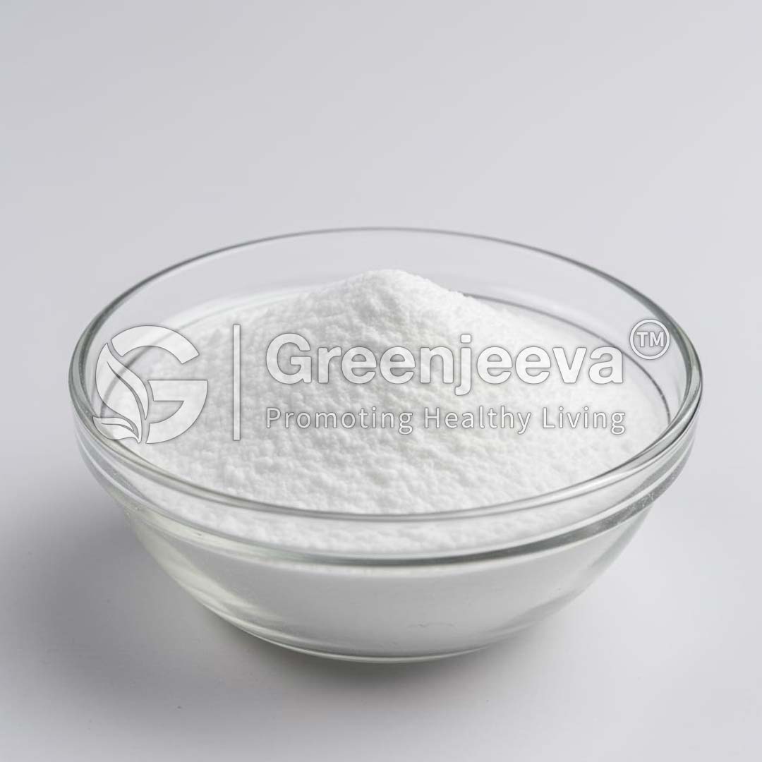 A clear glass bowl filled with a mound of Sodium Citrate powder, set against a plain light background, with "Greenjeeva" branding visible.