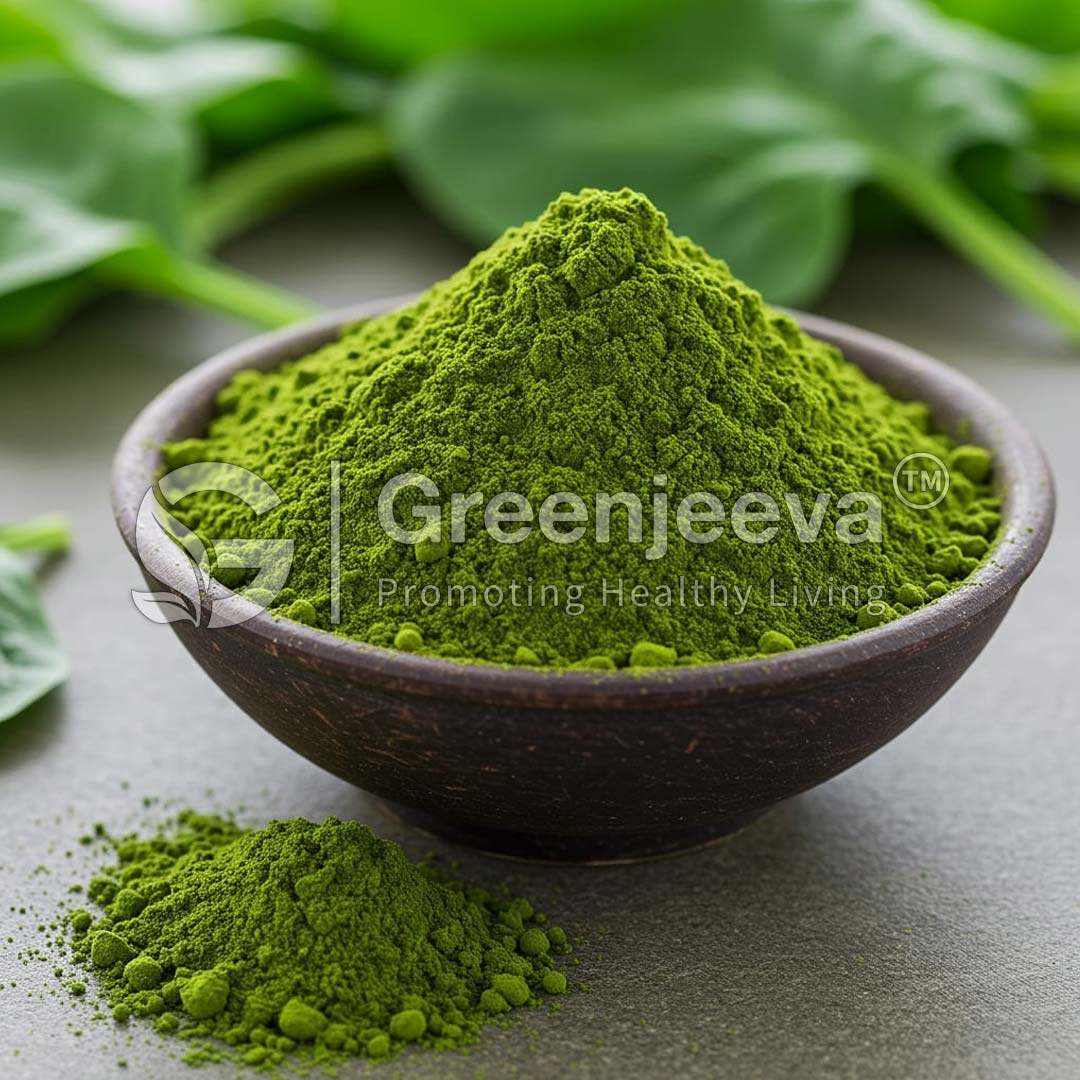 A bowl filled with Spinach Extract Powder sits on a surface, surrounded by leafy greens, conveying a sense of health and vitality.