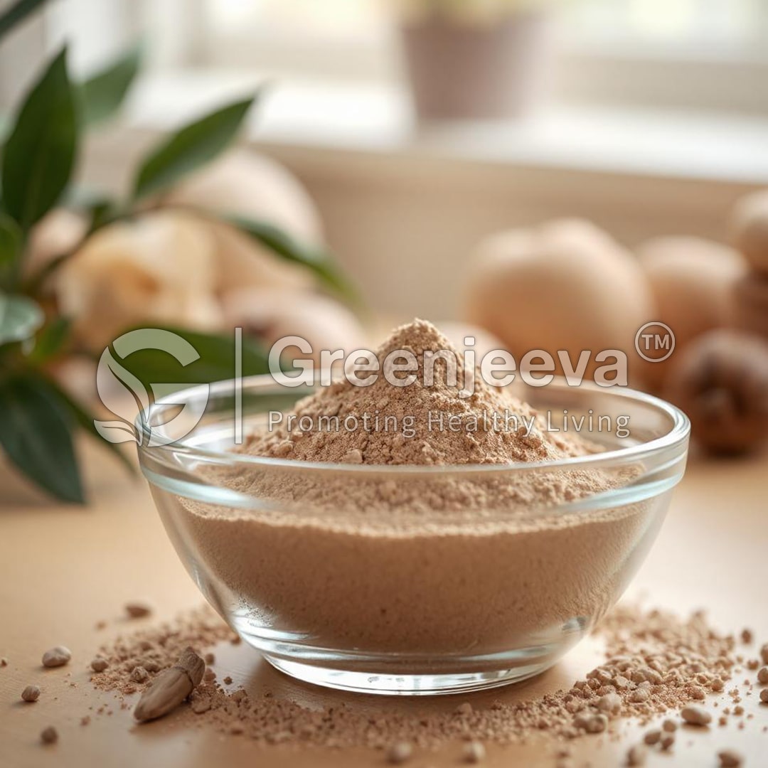 A glass bowl filled with Taurine Powder, surrounded by natural elements, suggesting health and wellness. Greenjeeva branding visible.