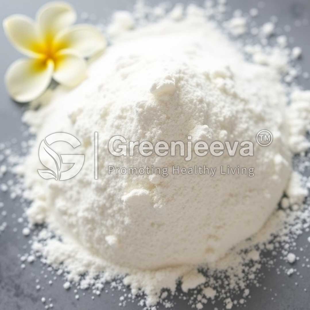 A mound of white powder with scattered grains, accompanied by a delicate yellow flower, featuring the Greenjeeva logo.